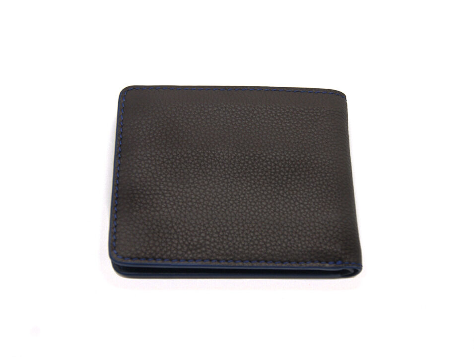 Cartera de piel combinada.